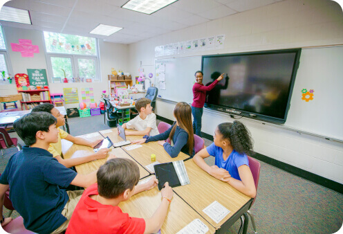 students in a classroom using the ActivPanel
