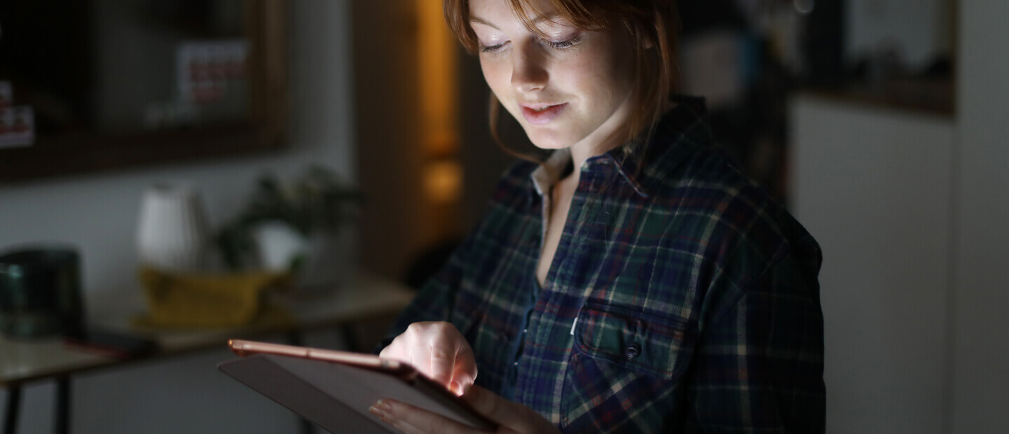 Woman using an iPad. 