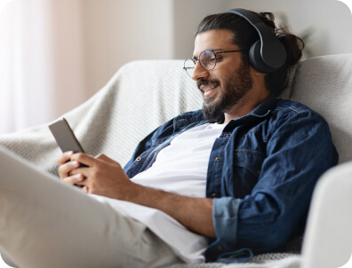 man listening to a podcast