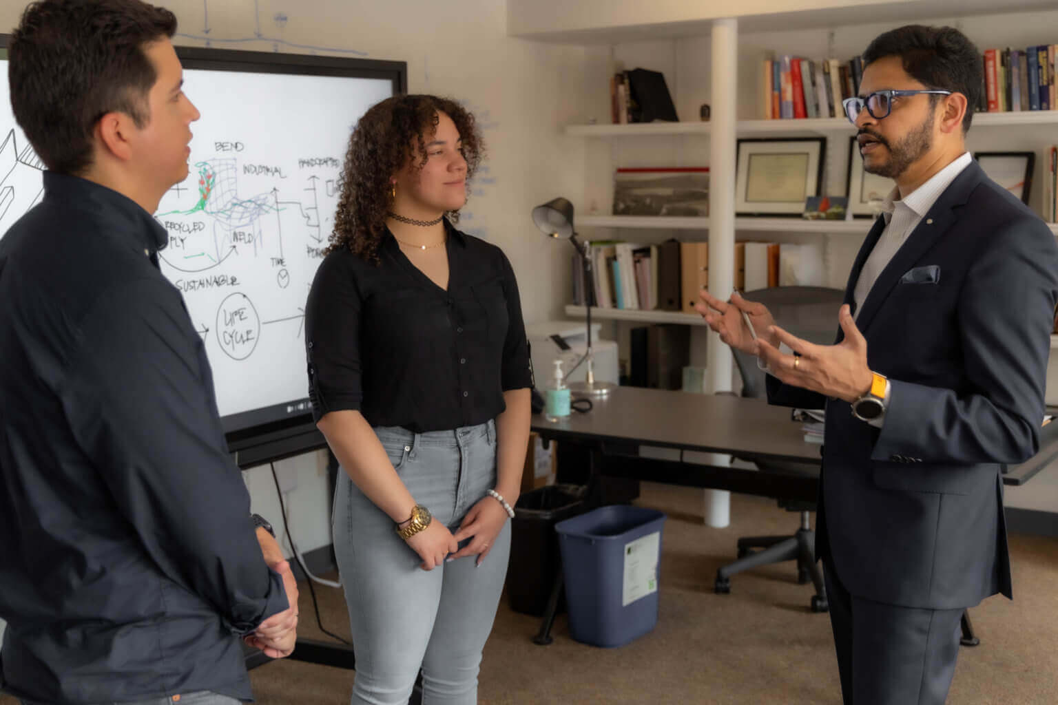 President Dass with students at an ActivPanel