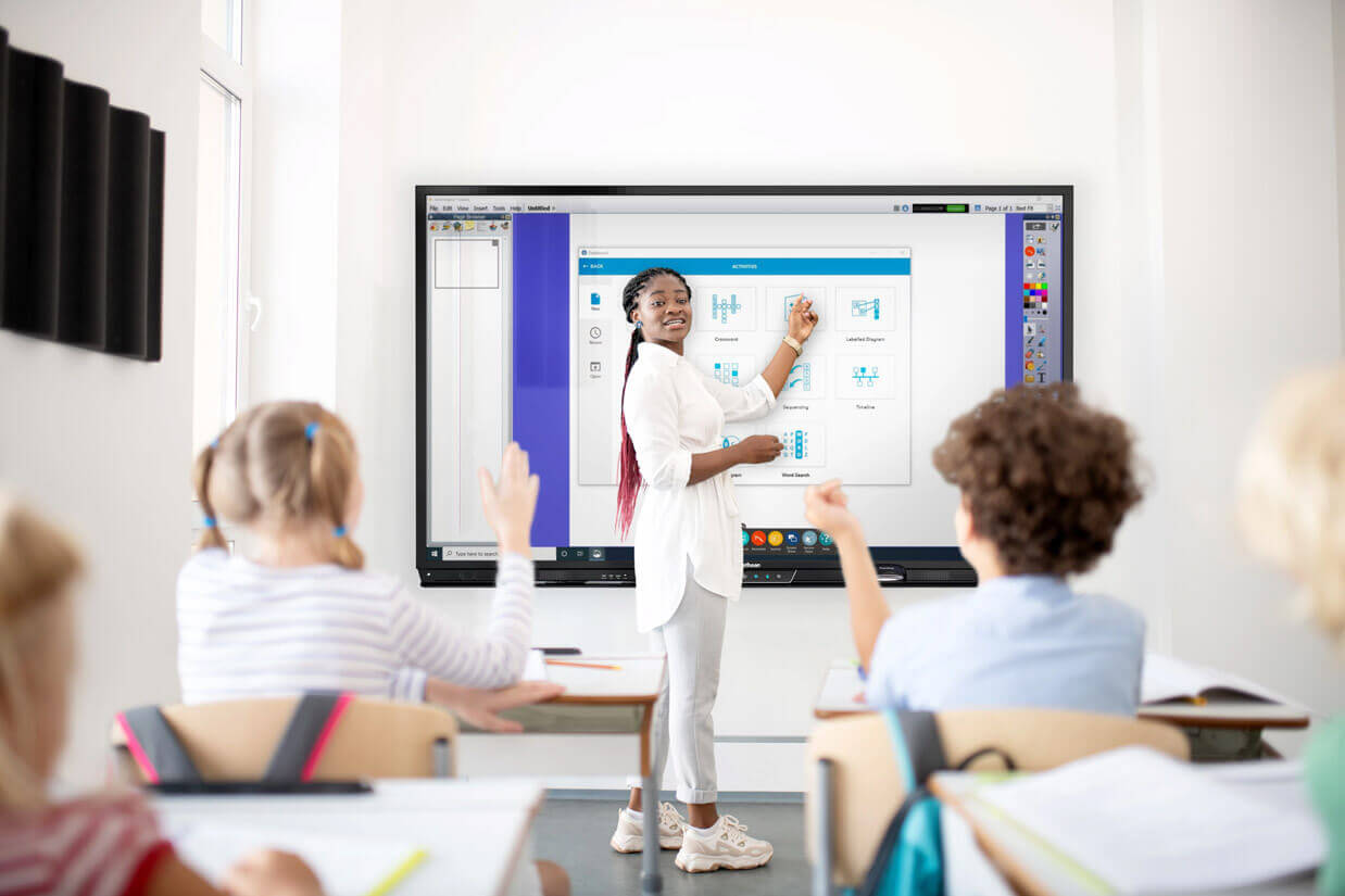 Teacher using an interactive whiteboard with a language app