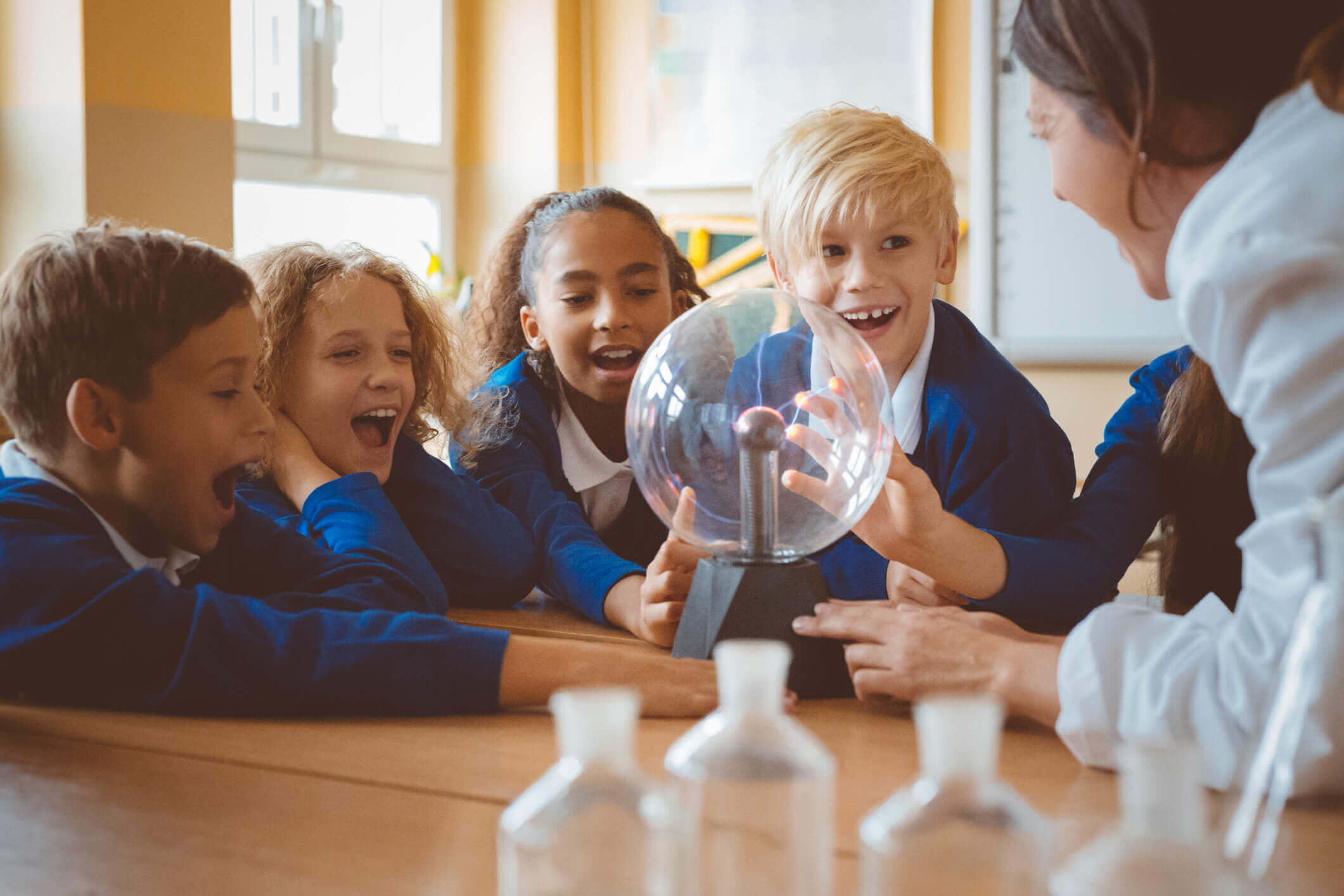 KS1/ KS2 Science Classroom with teacher and students studying electricity