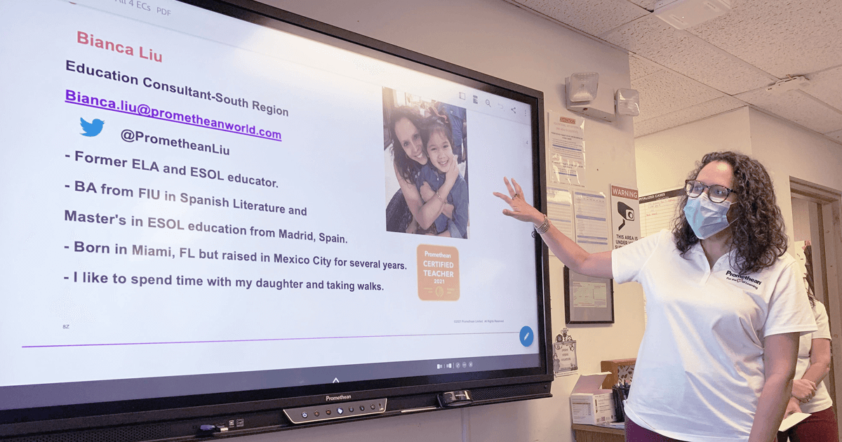 teacher teaching students using an interactive whiteboard