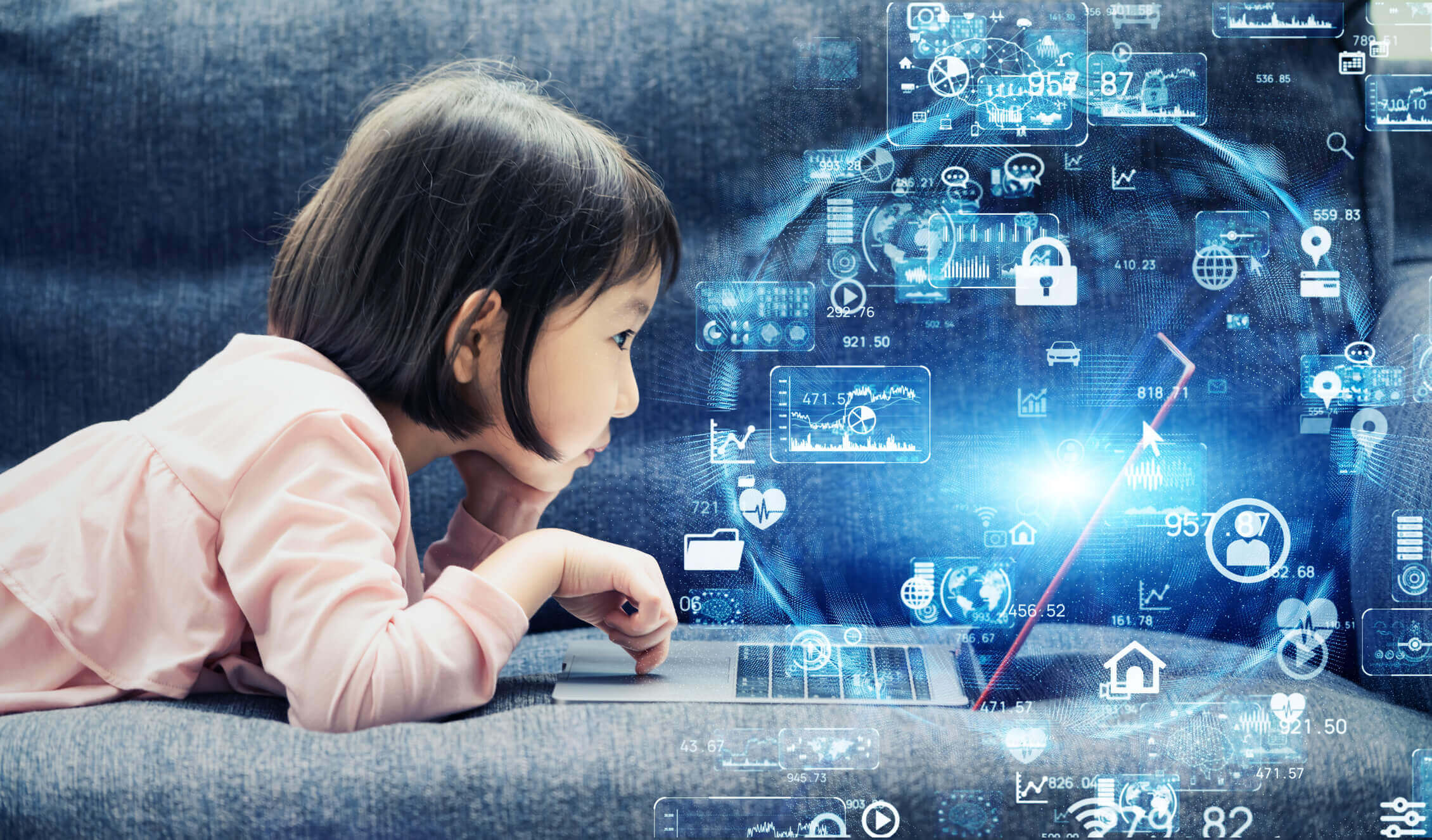 young girl on a laptop displaying the world of computing