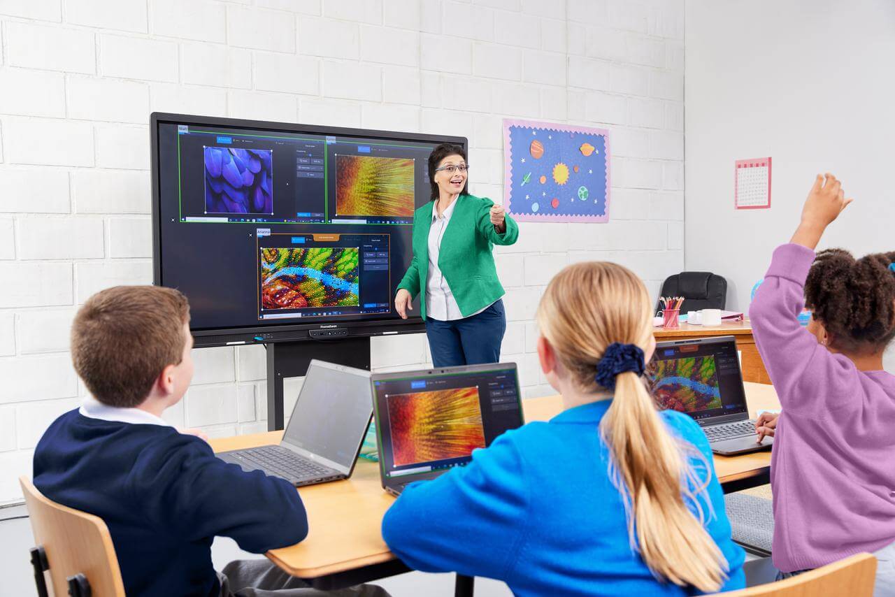 students and teachers using technology in the classroom